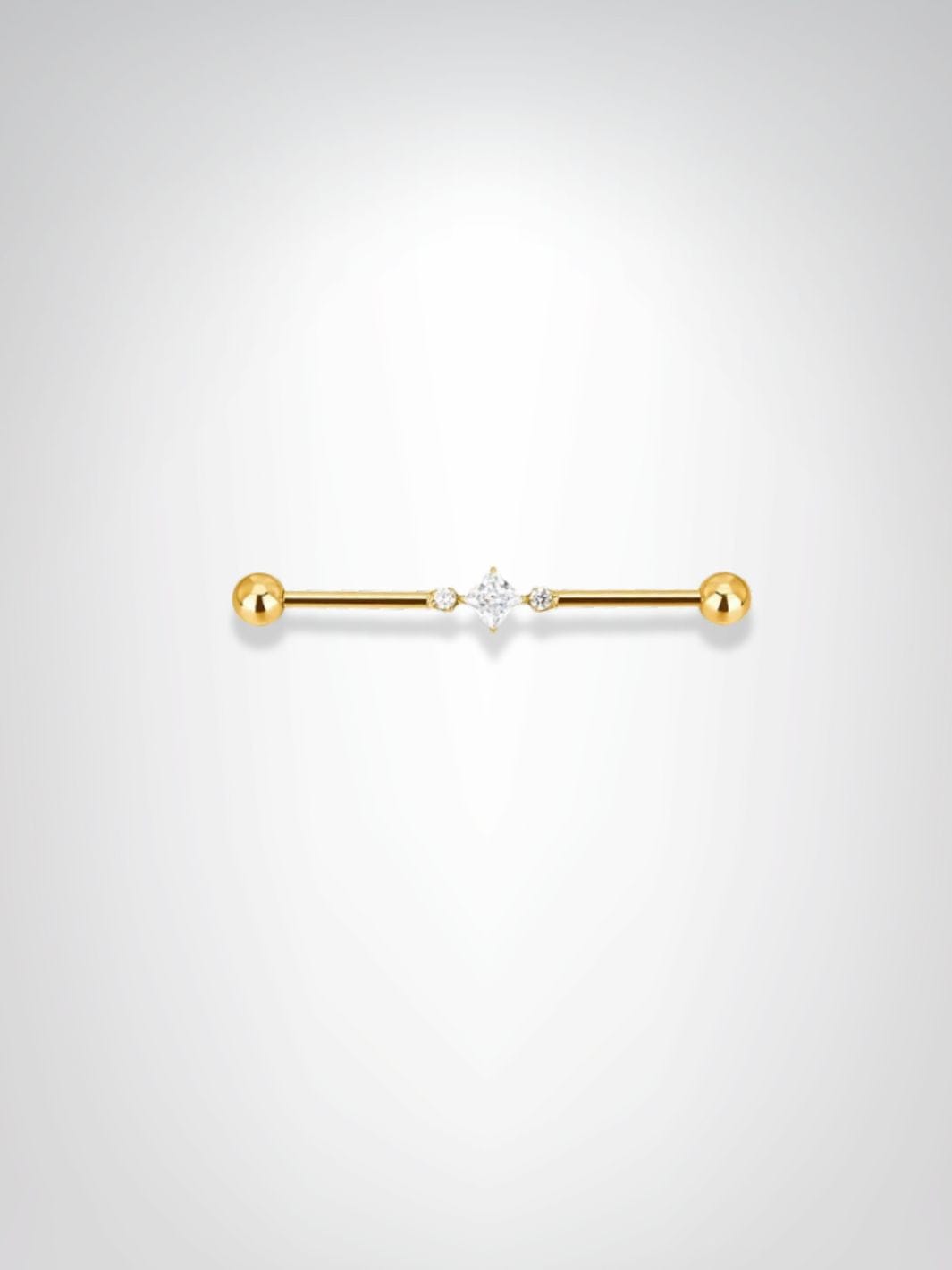 Piercing Industriel | La Trinité Dorée Dorée